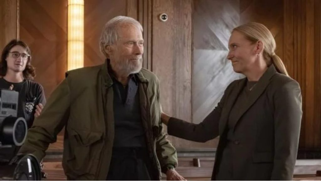 Clint Eastwood on the set of Juror #2 with Toni Collette, highlighting the director’s work on the gripping courtroom drama about guilt and morality.